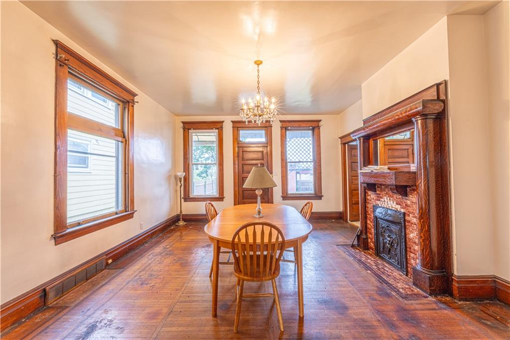 114 Union Street Uniontown, PA 15401 - Photo 6 of 28 a view of a dining room with furniture wooden floor and chandelier
