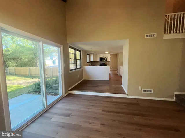 a view of entryway with wooden floor