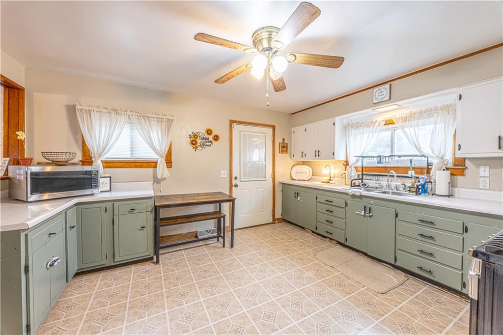 210 Stone Church Road Grindstone, PA 15442 - Photo 3 of 18 a large kitchen with a large window