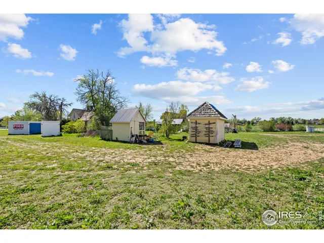a bathroom with a sink and a yard