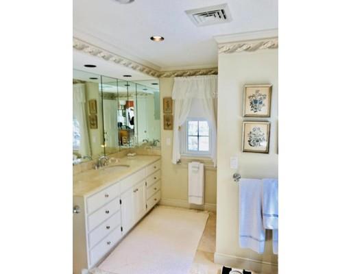 390 Eel River Road Barnstable, MA 02655 - Photo 21 of 27 a spacious bathroom with a double vanity sink a mirror and a shower
