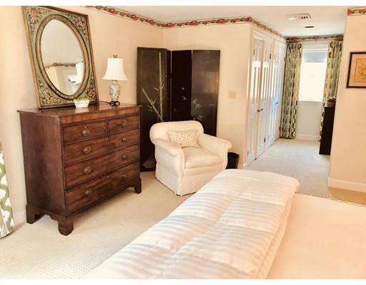 390 Eel River Road Barnstable, MA 02655 - Photo 23 of 27 a living room with furniture and a mirror