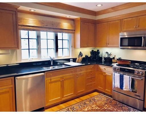 390 Eel River Road Barnstable, MA 02655 - Photo 9 of 27 a kitchen with stainless steel appliances granite countertop a stove a sink and a microwave