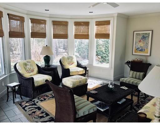 390 Eel River Road Barnstable, MA 02655 - Photo 10 of 27 a living room with furniture and floor to ceiling windows