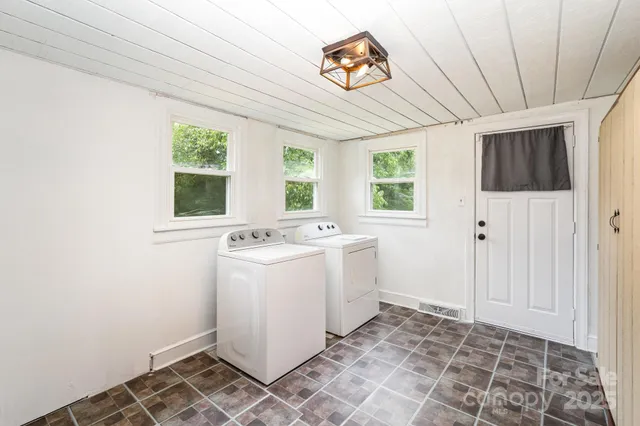 a room with a stove and a window