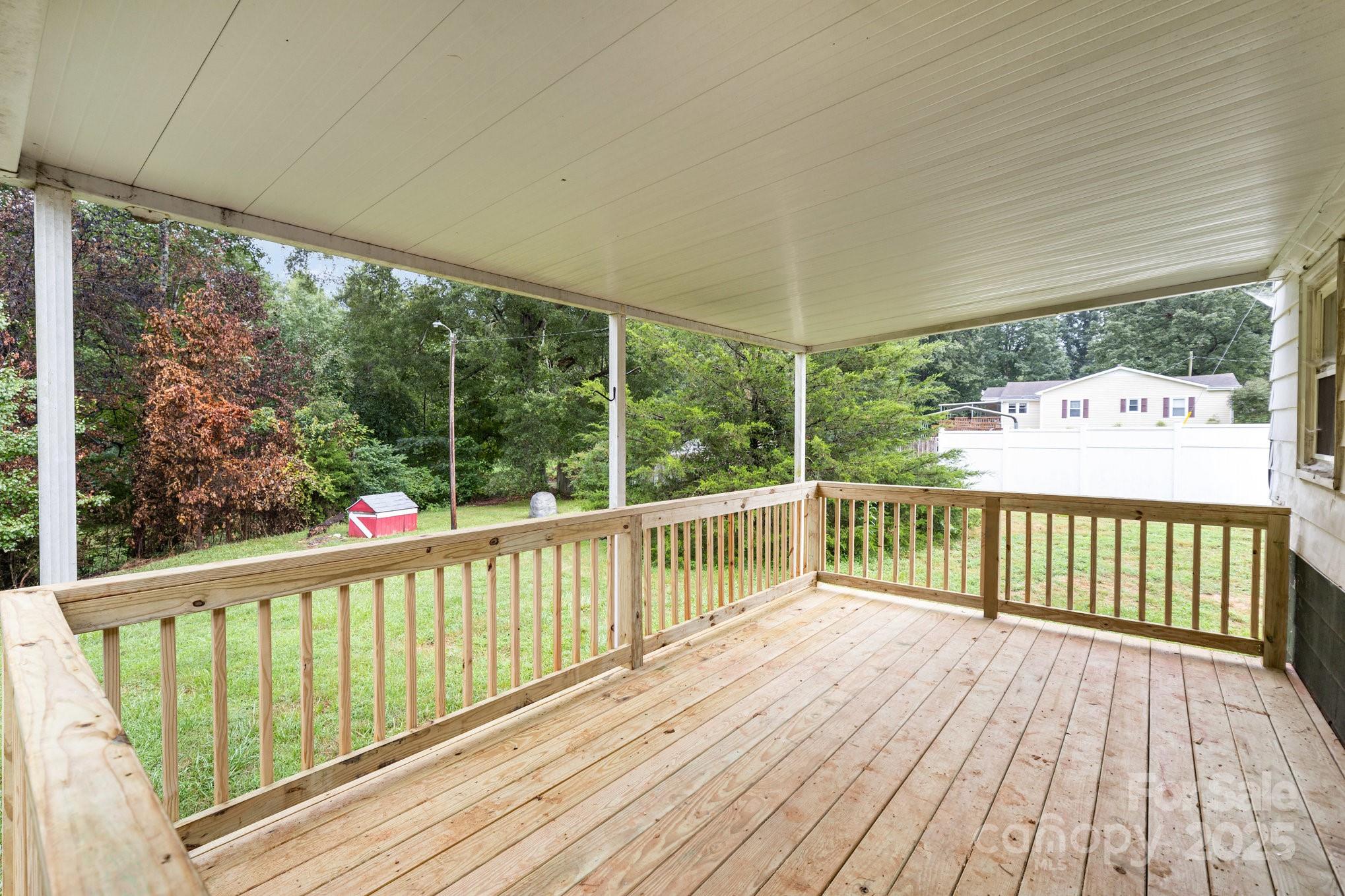 264 Mauney Farm Road Cherryville, NC 28021 - Photo 2 of 25 a view of a balcony with wooden floor