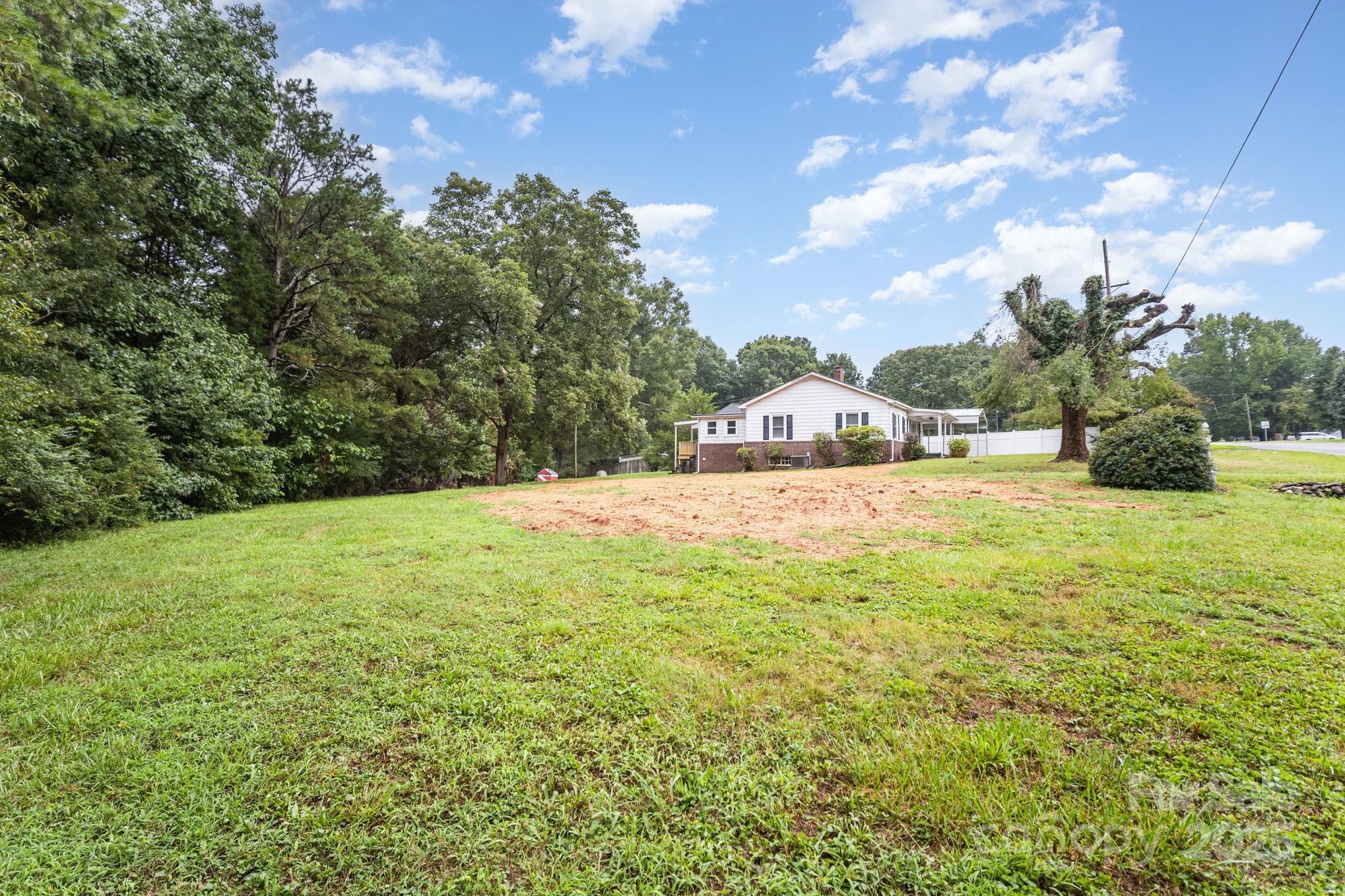 264 Mauney Farm Road Cherryville, NC 28021 - Photo 24 of 25 a view of swimming pool with an outdoor space and seating area