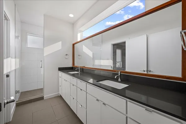 a view of a hallway with washer and dryer