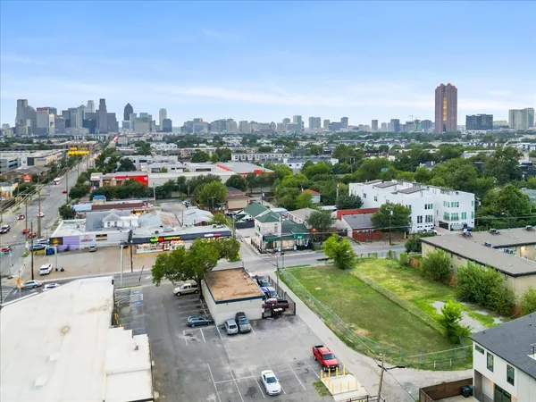 an aerial view of a building with a garden
