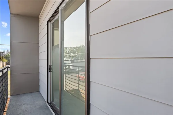 a view of entryway with wooden floor
