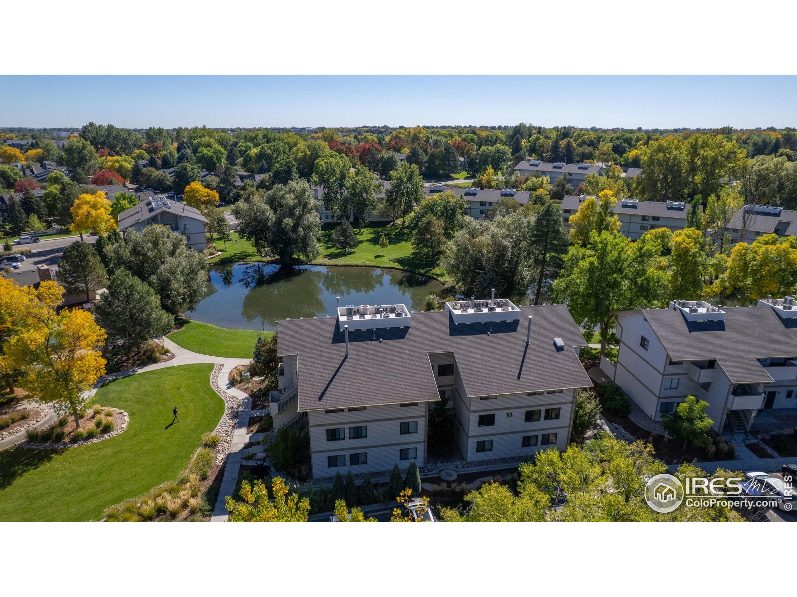 1705 Heatheridge Road, Unit M204 Fort Collins, CO 80526 - Photo 21 of 35 an aerial view of a house with a yard