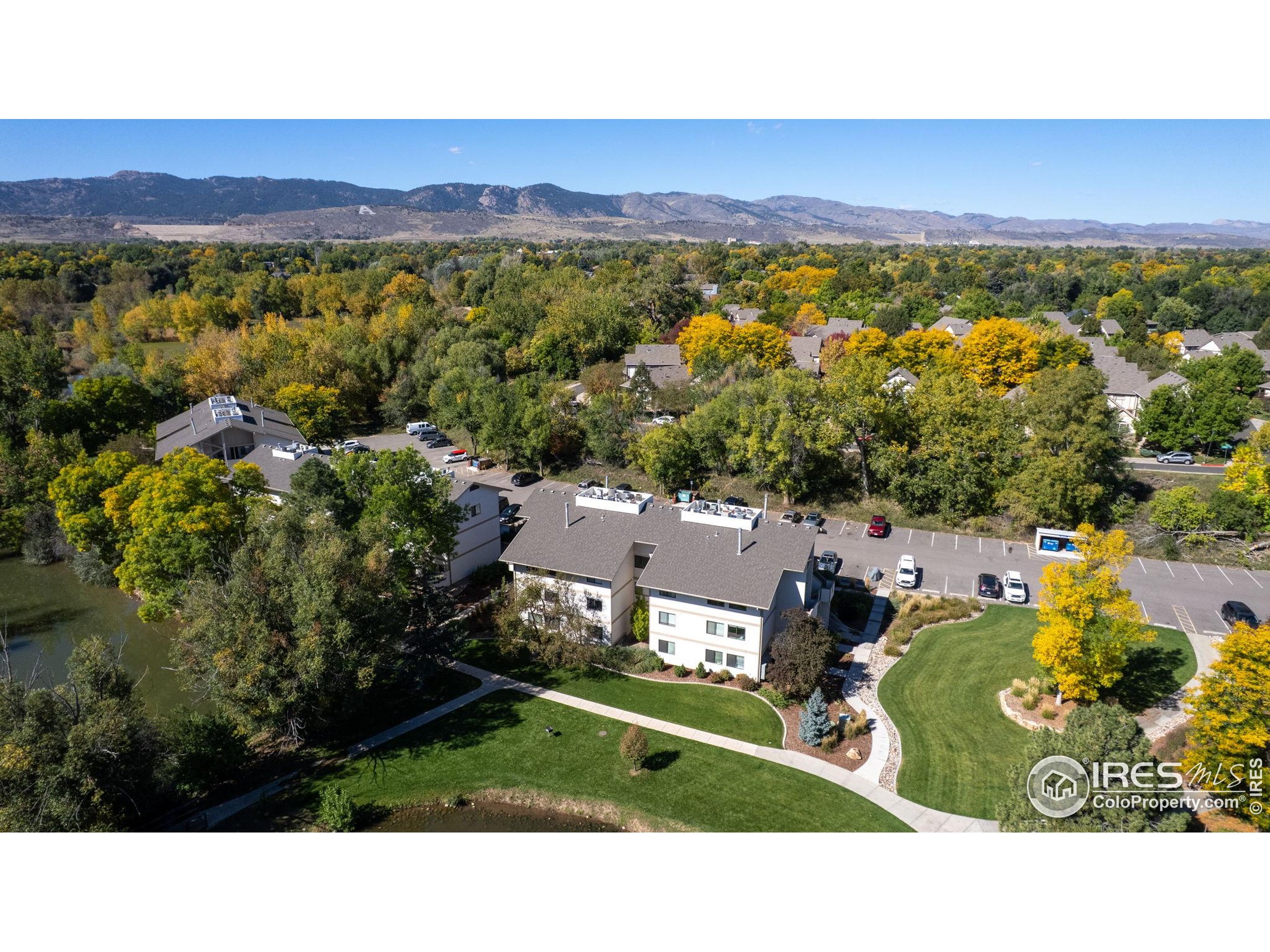 1705 Heatheridge Road, Unit M204 Fort Collins, CO 80526 - Photo 26 of 35 a view of a city with mountains