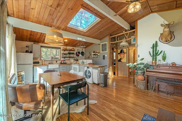 a room with lots of furniture and entrance