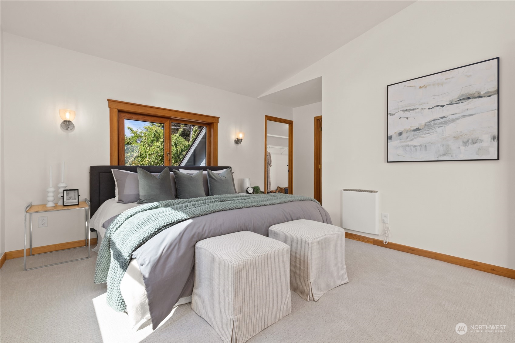 4115 Southwest 106th Street Seattle, WA 98146 - Photo 26 of 40 a bedroom with a bed and a painting on the wall