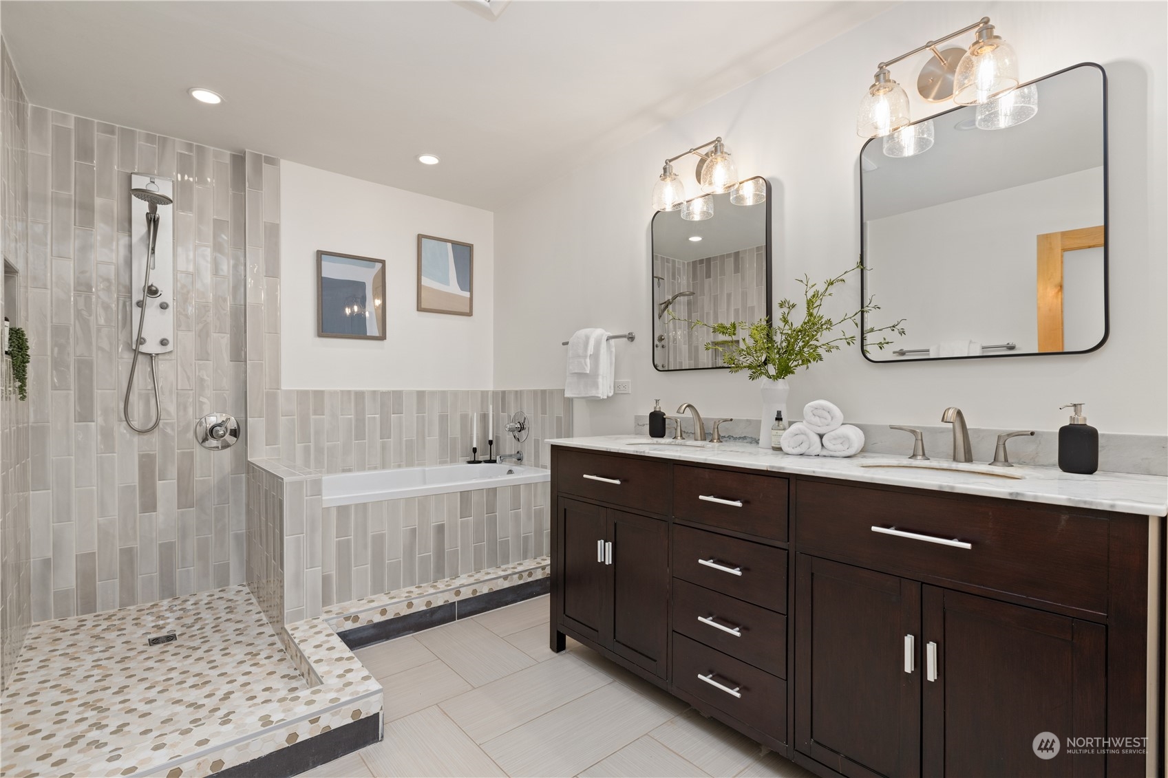 4115 Southwest 106th Street Seattle, WA 98146 - Photo 32 of 40 a bathroom with a double vanity sink mirror and bathtub