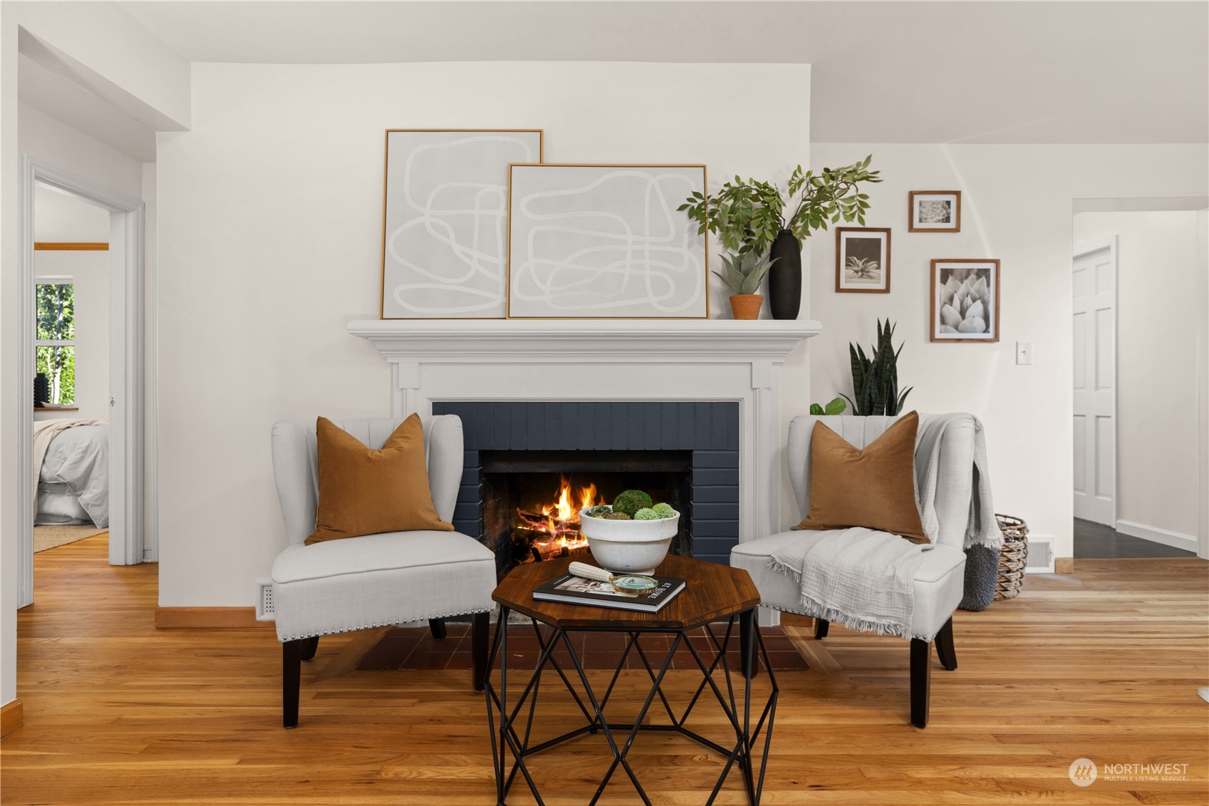 4115 Southwest 106th Street Seattle, WA 98146 - Photo 4 of 40 a living room with furniture and a fireplace