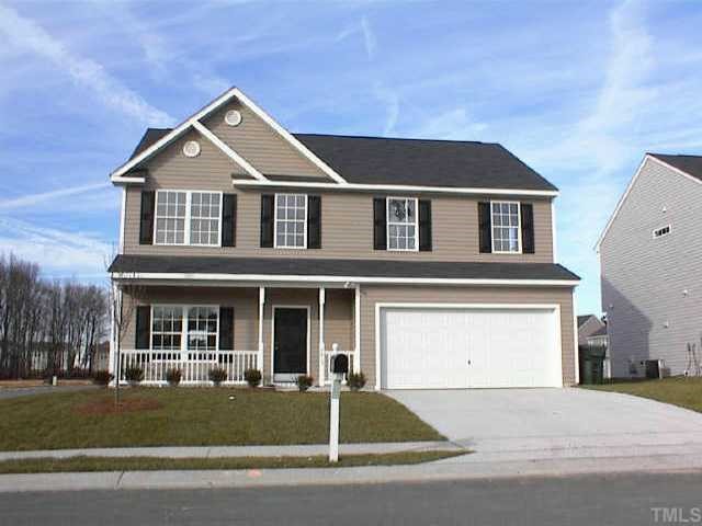 3415 Tuckland Drive Raleigh, NC 27610 - Photo 1 of 1 a front view of a house with a yard