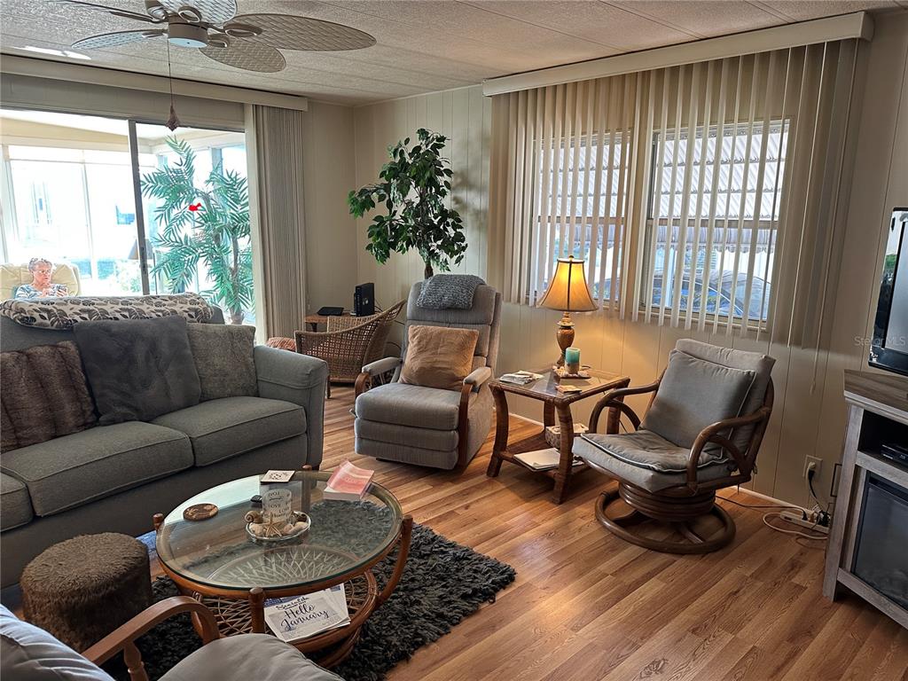 5800 Forsythia Road Venice, FL 34293 - Photo 6 of 27 a living room with furniture and a large window