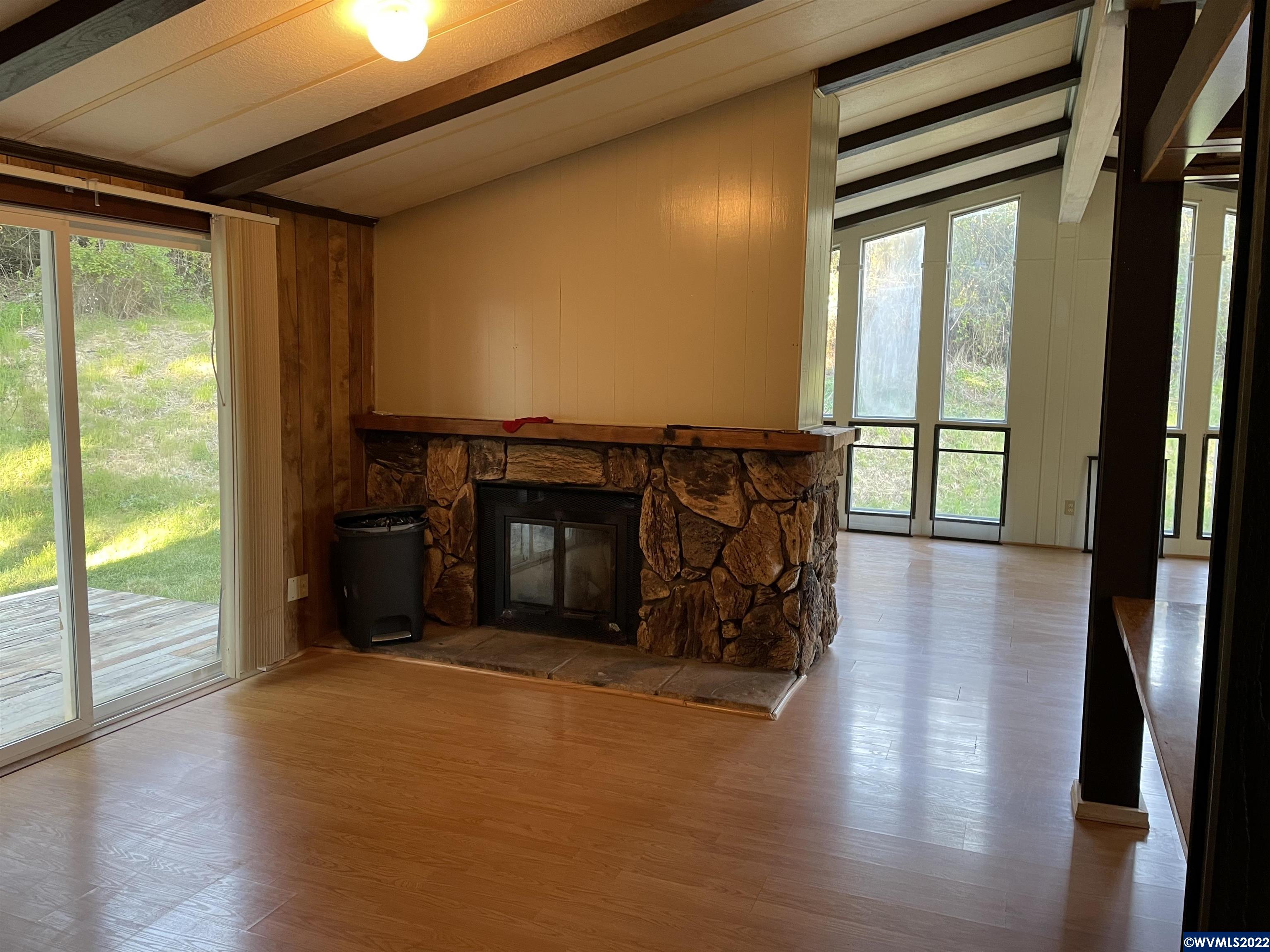 2011 Cole Road South Salem, OR 97306 - Photo 8 of 9 a living room with furniture and a fireplace