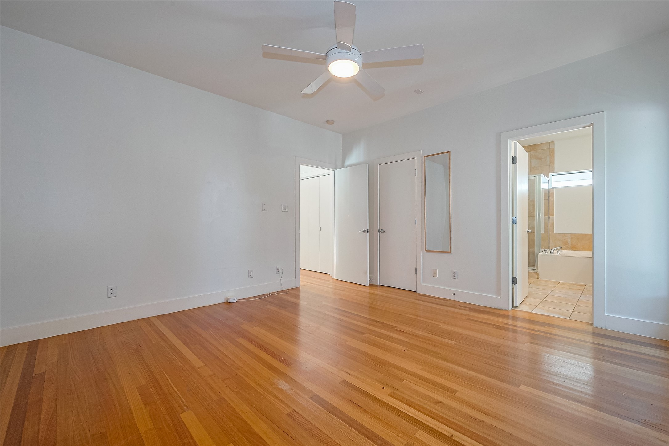 4331 Eigel Street Houston, TX 77007 - Photo 27 of 38 a view of an empty room with wooden floor
