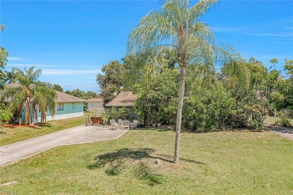 771 104th Avenue North Naples, FL 34108 - Photo 2 of 10 a view of a park with palm trees