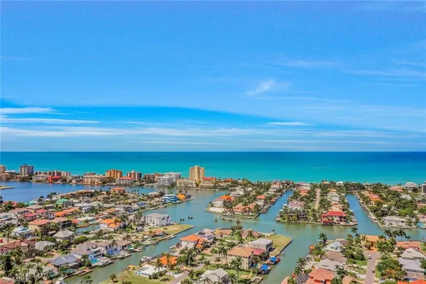 an aerial view of a house with a garden