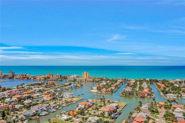 an aerial view of a house with a garden