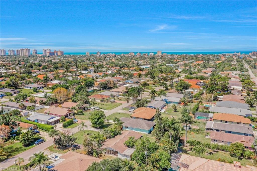 771 104th Avenue North Naples, FL 34108 - Photo 8 of 10 an aerial view of residential building with green space