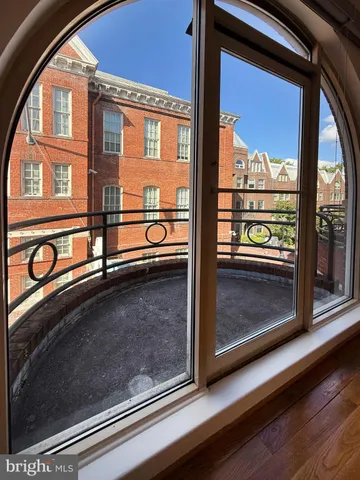 a view of a door and a window