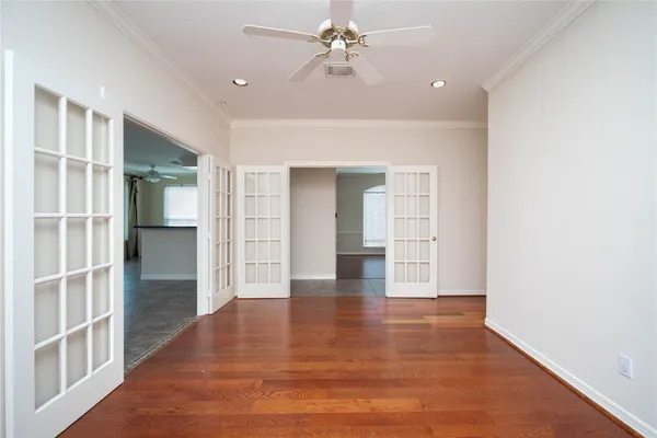 a view of a hallway with windows
