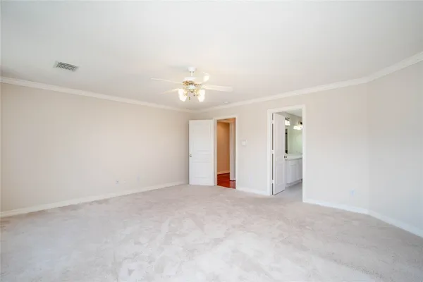 a bathroom with a double vanity sink mirror and shower