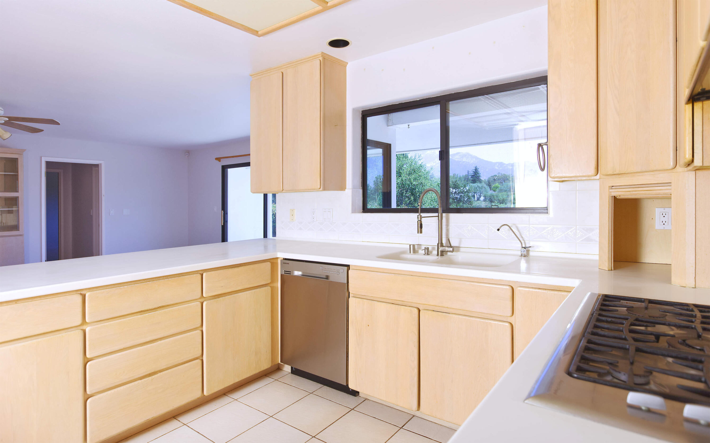940 Camino Del Rio Santa Barbara, CA 93110 - Photo 8 of 28 Kitchen to Family Room