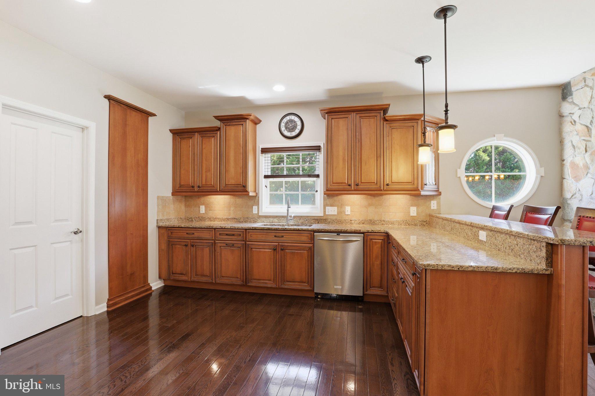 16932 Fitzgeralds Road Lincoln, DE 19960 - Photo 54 of 103 Warm wood tones in a stylish kitchen.
