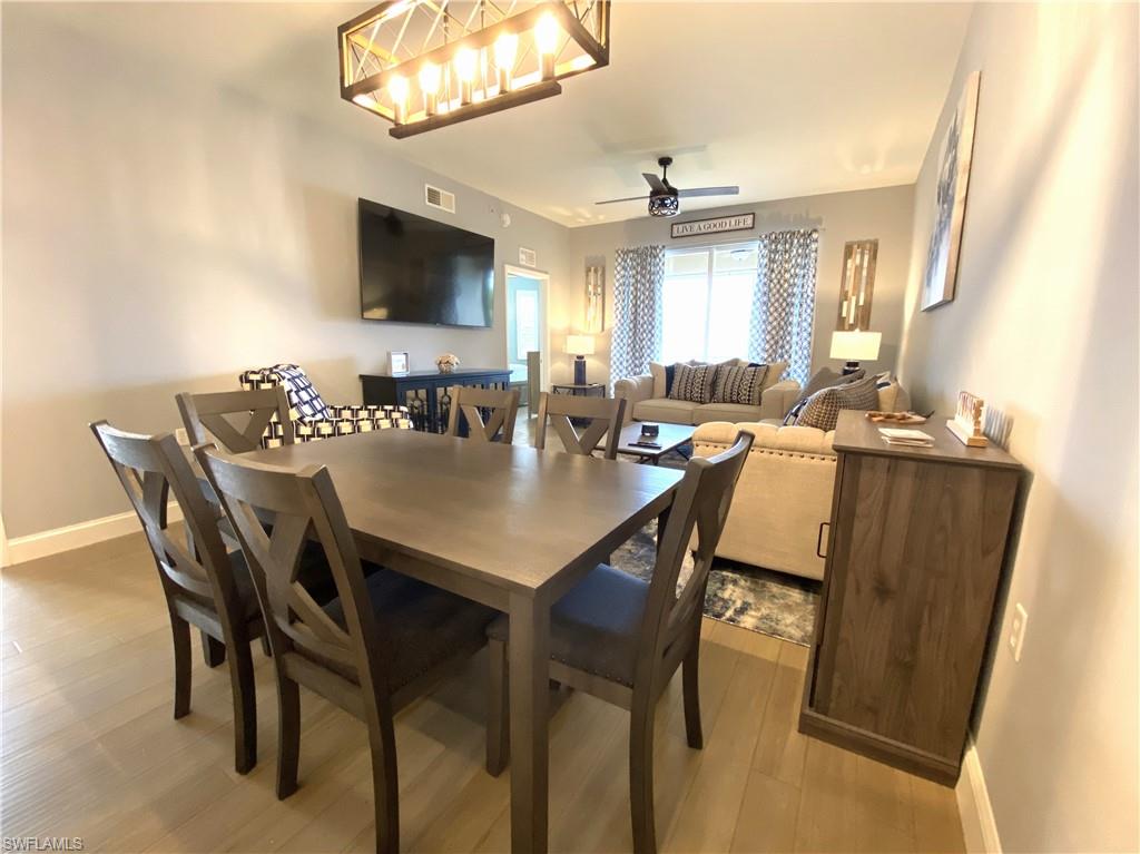 2730 Cypress Trace Circle, Unit 2820 Naples, FL 34119 - Photo 11 of 35 Dining Room