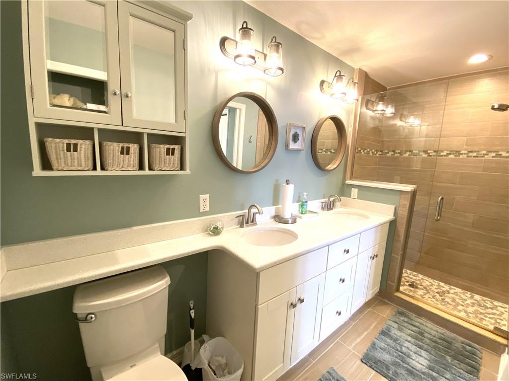 2730 Cypress Trace Circle, Unit 2820 Naples, FL 34119 - Photo 17 of 35 Master Bath