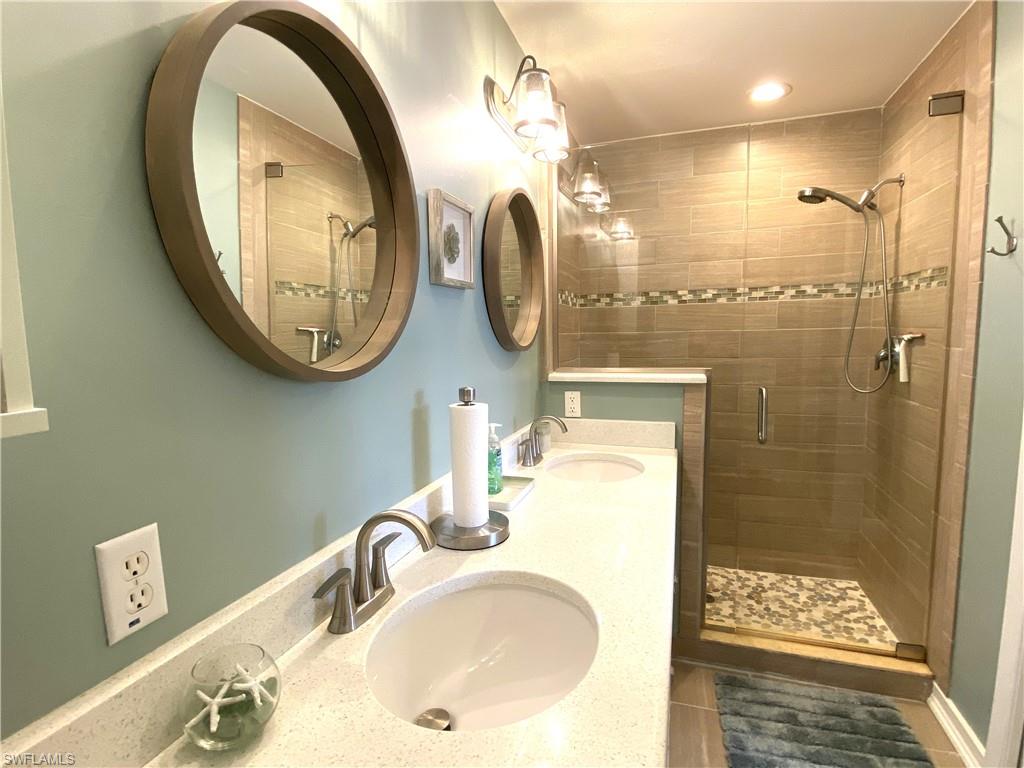 2730 Cypress Trace Circle, Unit 2820 Naples, FL 34119 - Photo 18 of 35 Master Bath