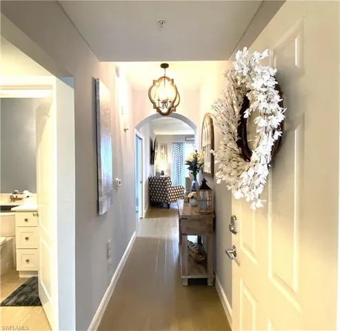 a view of a hallway with entryway
