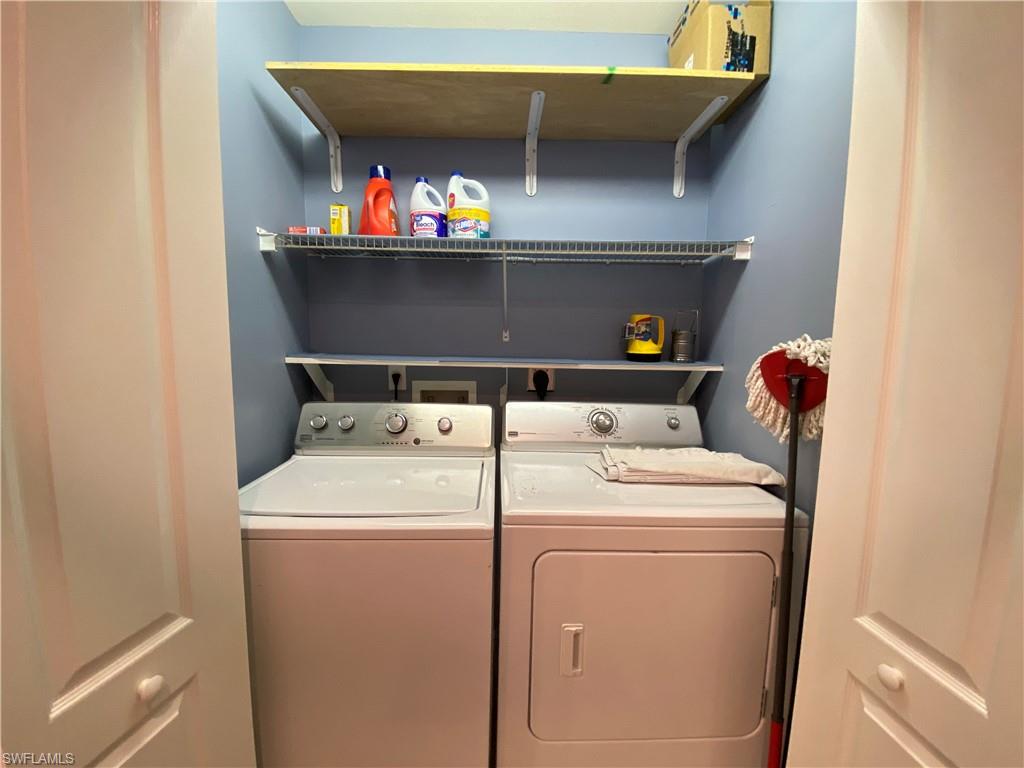2730 Cypress Trace Circle, Unit 2820 Naples, FL 34119 - Photo 22 of 35 Laundry in Guest Bath