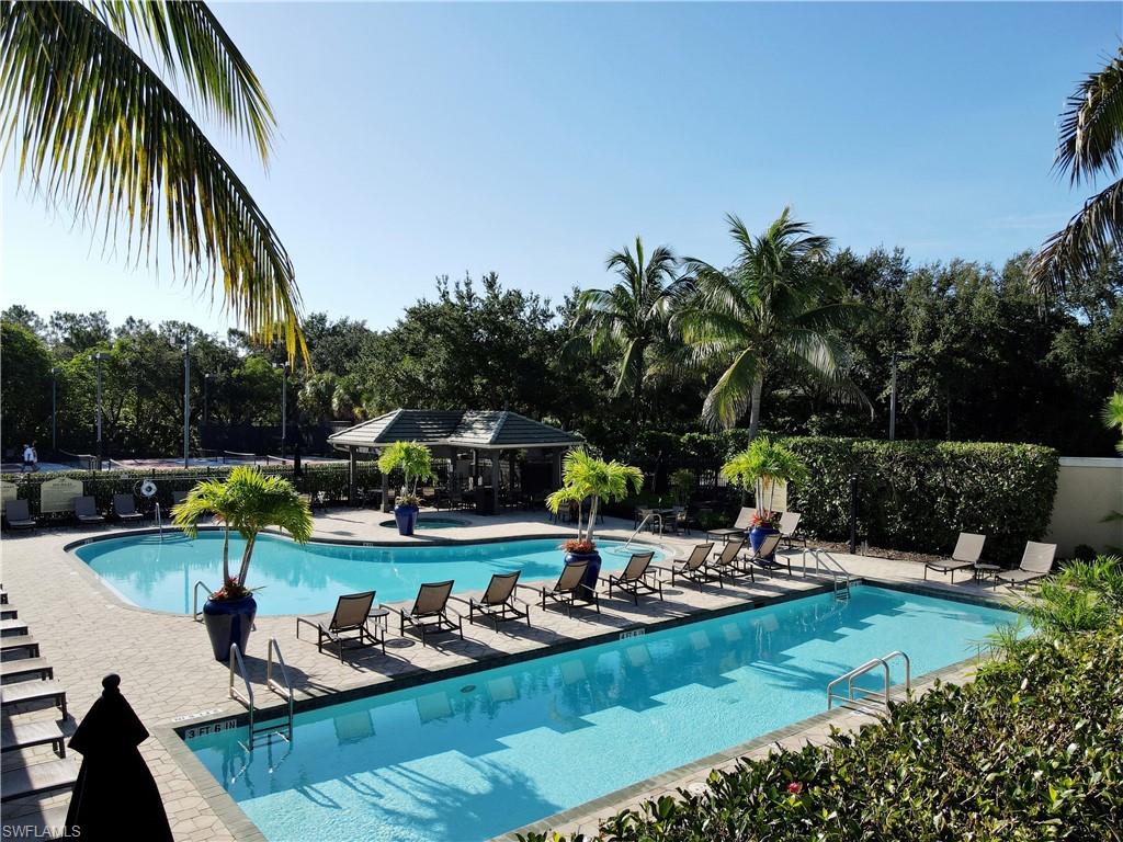 2730 Cypress Trace Circle, Unit 2820 Naples, FL 34119 - Photo 32 of 35 Master Clubhouse Pools