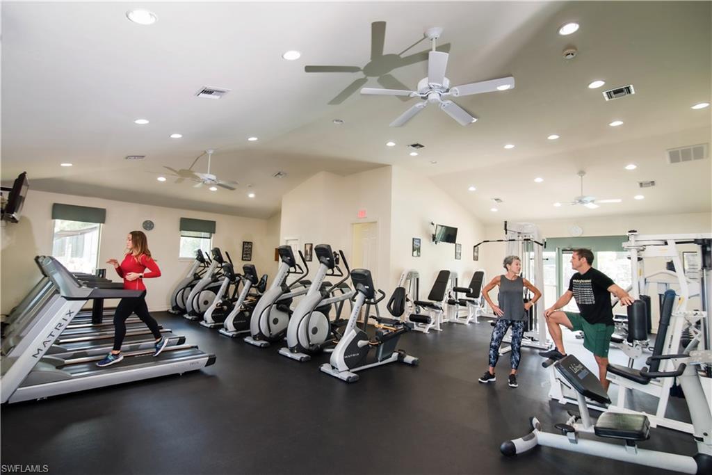 2730 Cypress Trace Circle, Unit 2820 Naples, FL 34119 - Photo 35 of 38 a view of a room with gym equipment