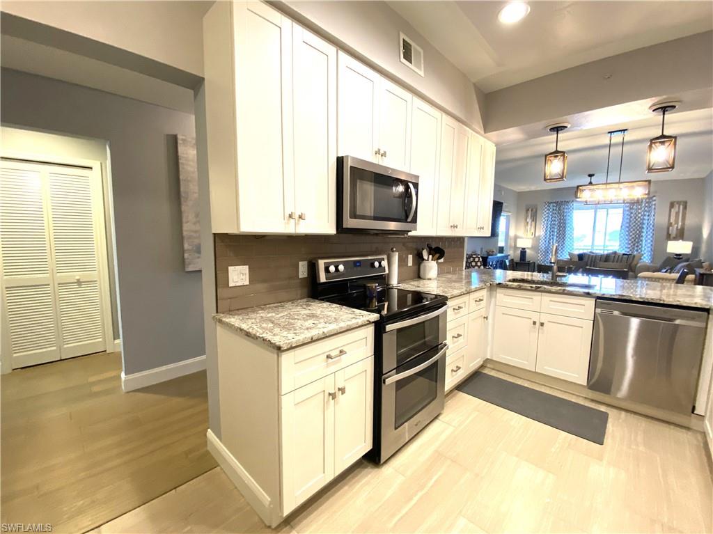 2730 Cypress Trace Circle, Unit 2820 Naples, FL 34119 - Photo 4 of 35 Kitchen