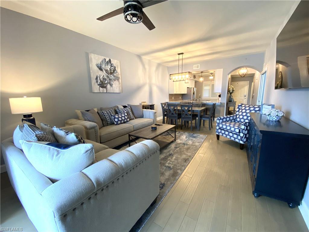 2730 Cypress Trace Circle, Unit 2820 Naples, FL 34119 - Photo 9 of 35 Living Room