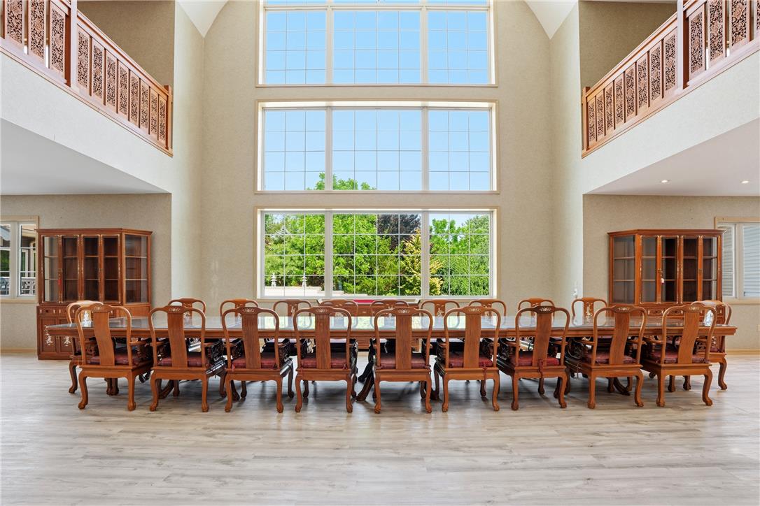 6271 Batman Road Zionsville, PA 18092 - Photo 10 of 100 An impressive dining room offers an airy atmosphere with soaring ceilings and an abundance of natural light.