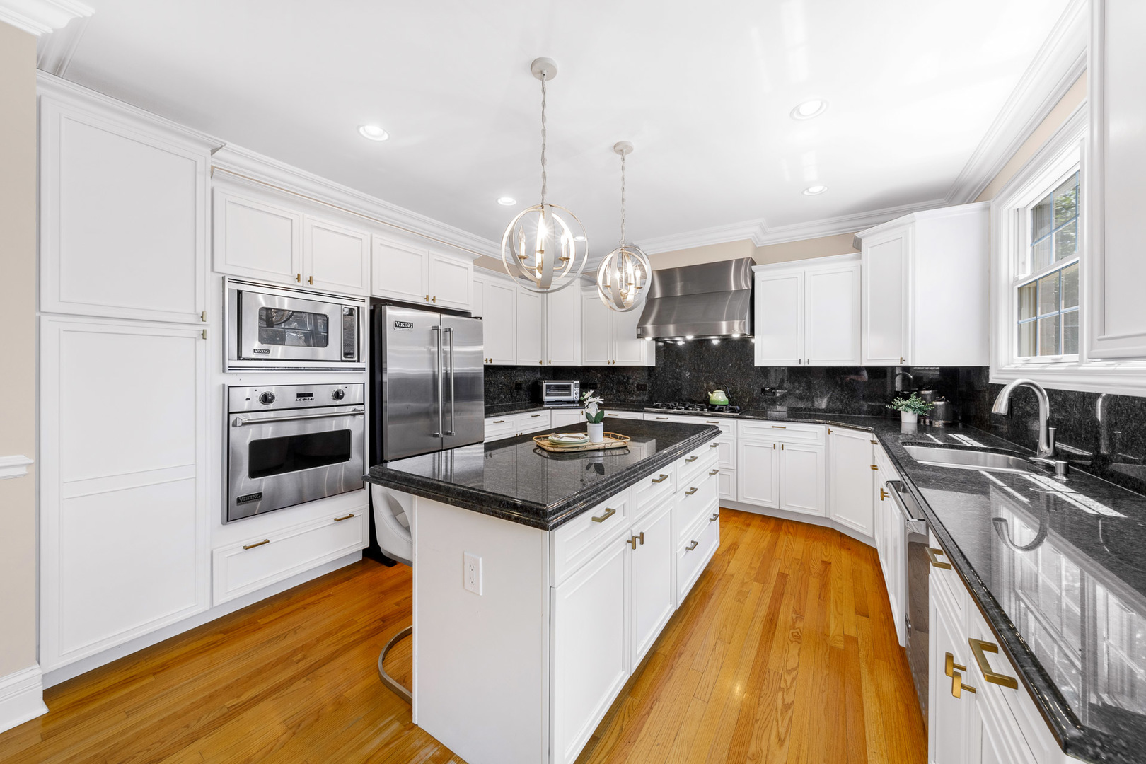 2235 Covert Road Glenview, IL 60025 - Photo 12 of 35 a kitchen with stainless steel appliances granite countertop a sink a stove and a refrigerator