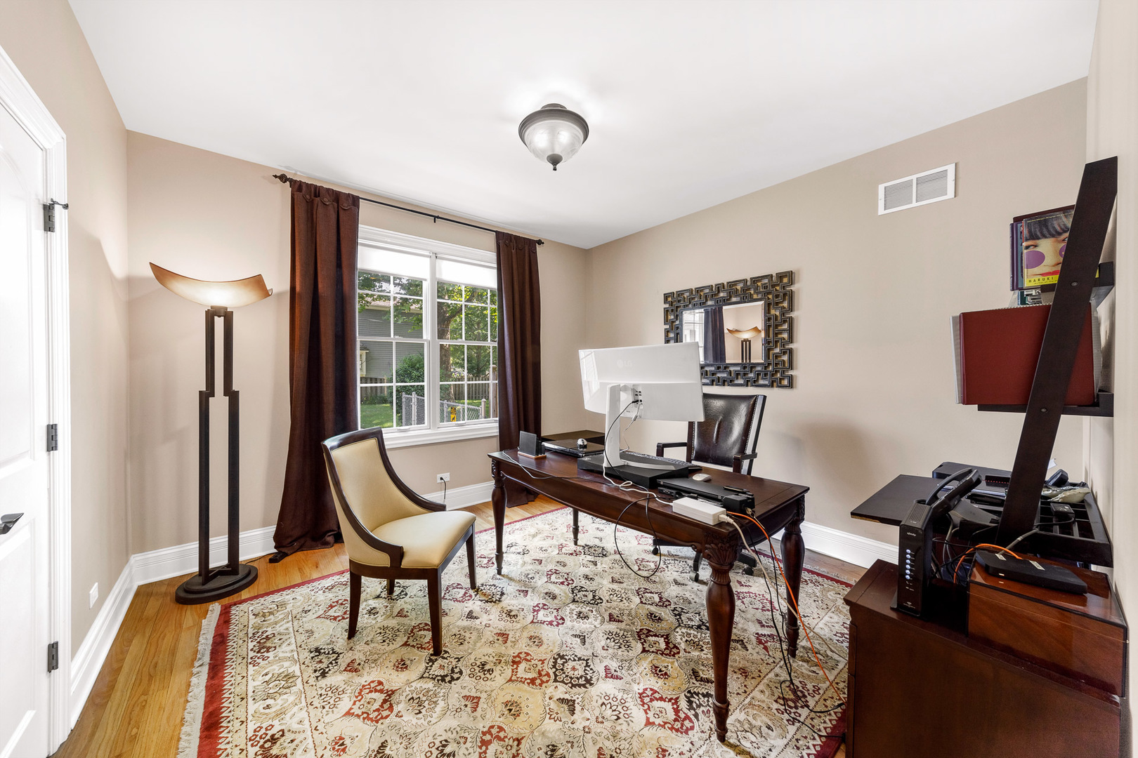 2235 Covert Road Glenview, IL 60025 - Photo 14 of 35 a room with furniture and a flat screen tv