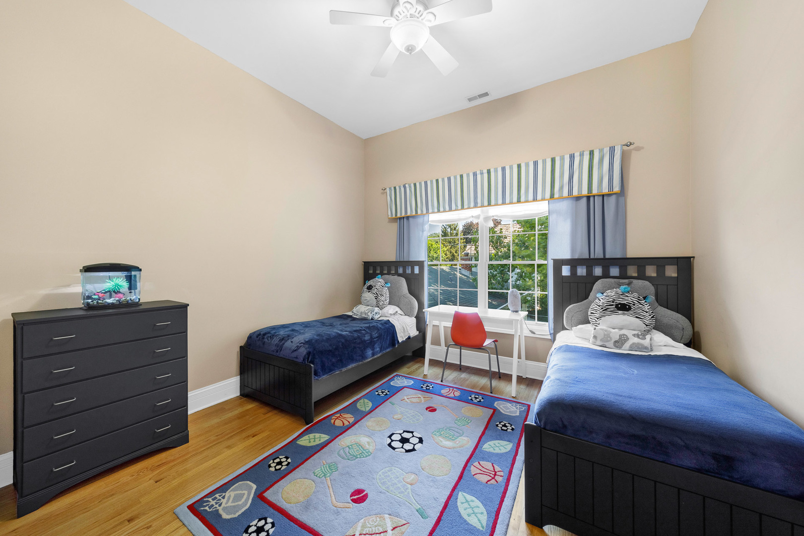 2235 Covert Road Glenview, IL 60025 - Photo 23 of 35 a bedroom with furniture and a window