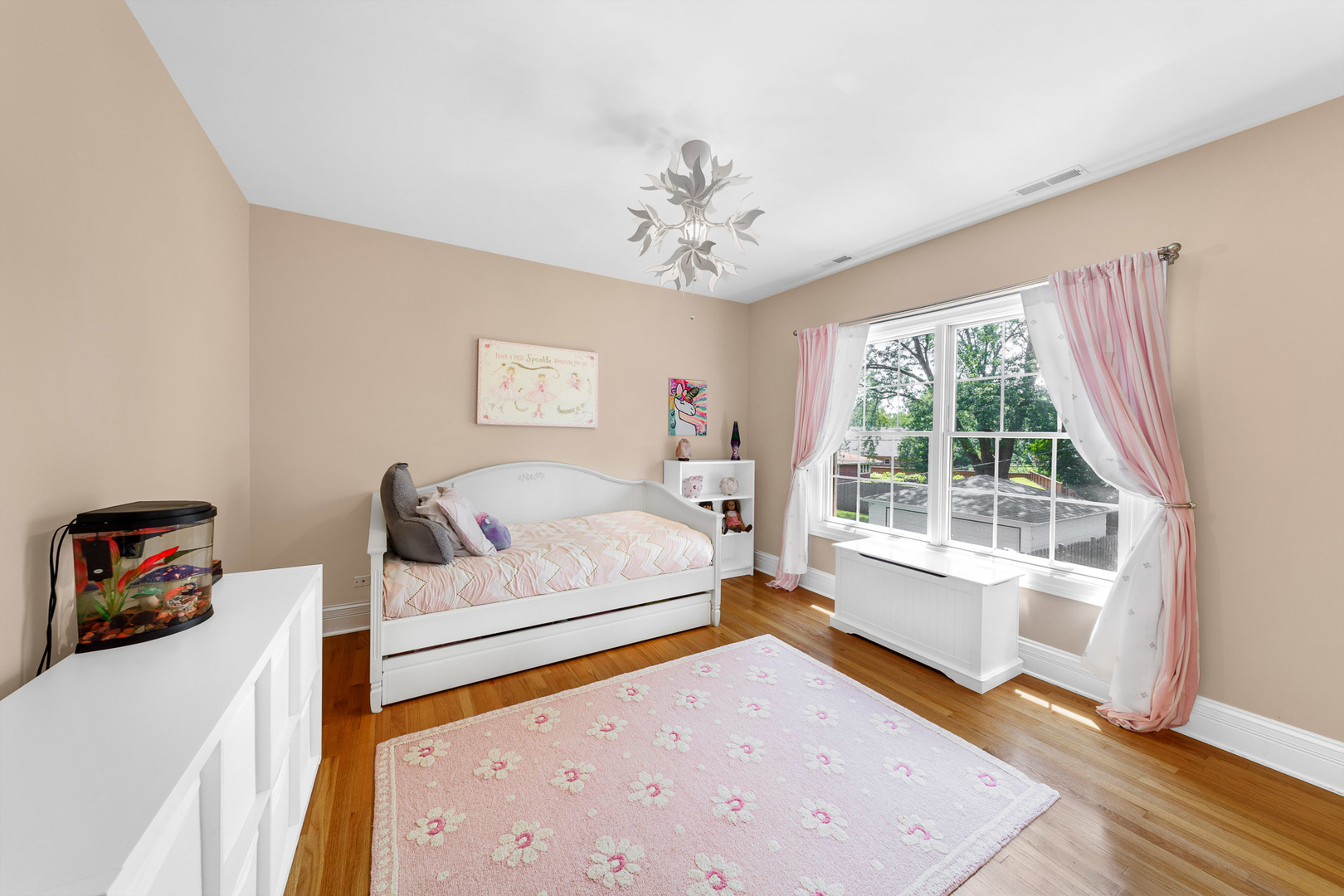 2235 Covert Road Glenview, IL 60025 - Photo 25 of 35 a bedroom with a bed and wooden floor