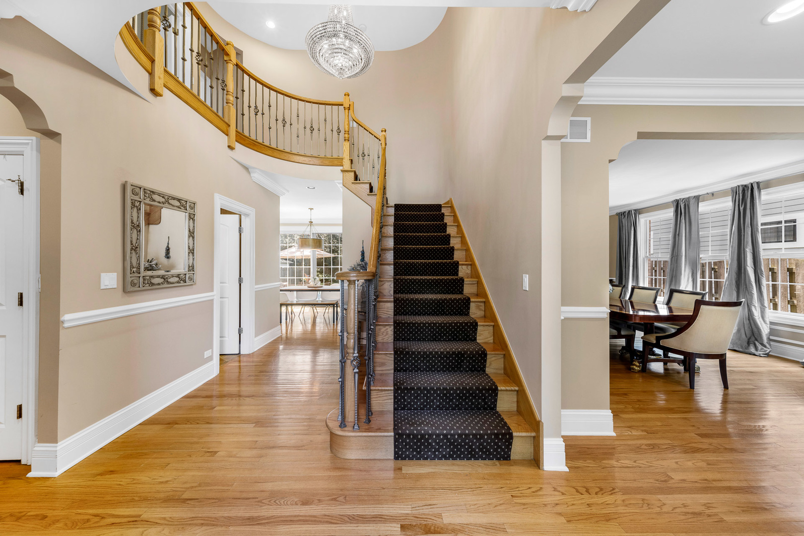 2235 Covert Road Glenview, IL 60025 - Photo 3 of 35 a view of entryway and hall with wooden floor