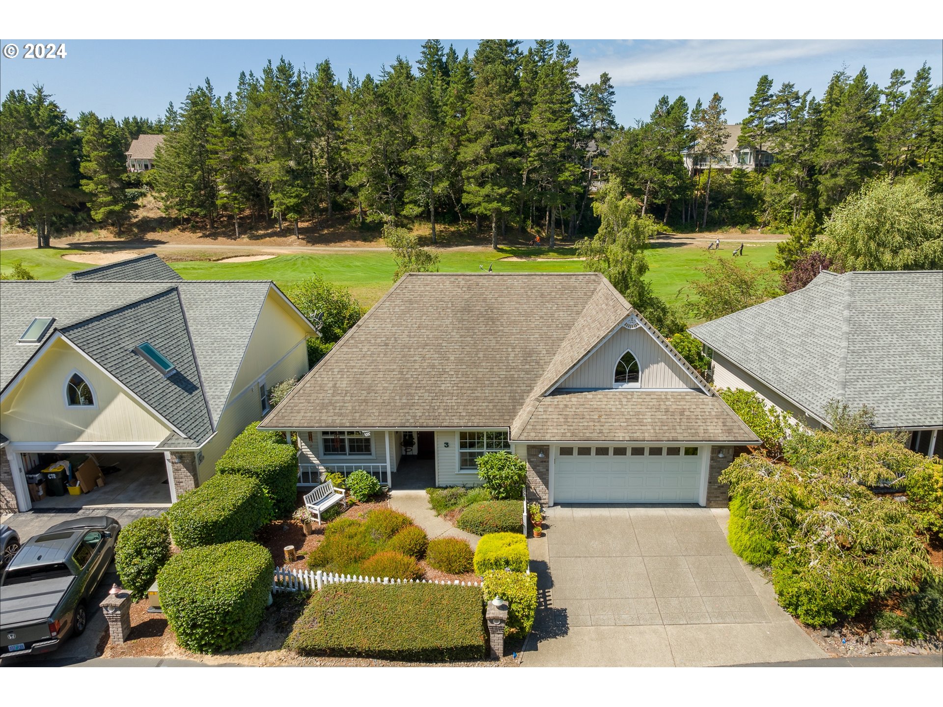 3 Waterford Downs Florence, OR 97439 - Photo 2 of 46 an aerial view of a house with swimming pool garden and patio