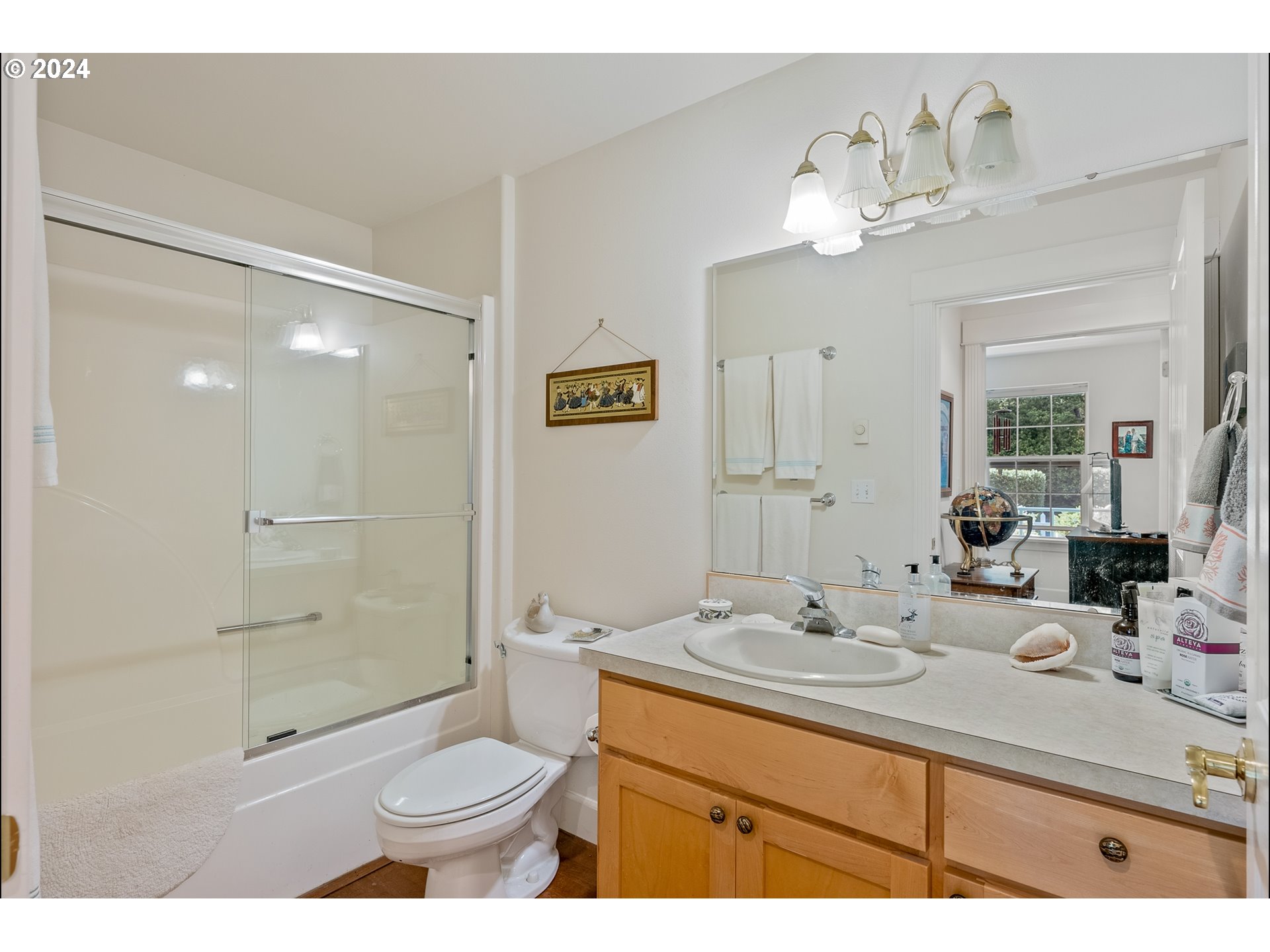 3 Waterford Downs Florence, OR 97439 - Photo 26 of 46 a bathroom with a sink toilet tub and shower